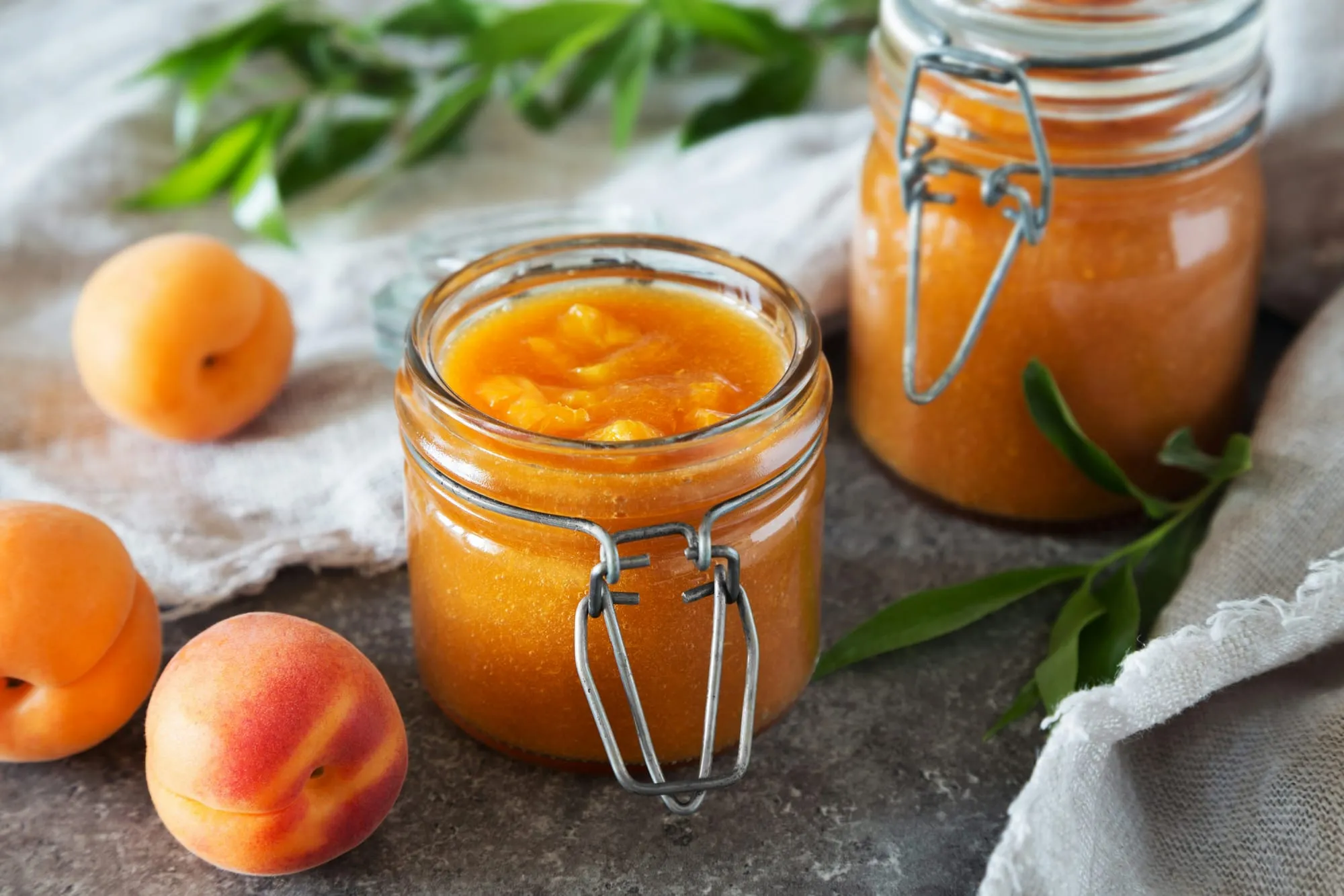 Jars of small-batch fruit goods made from neighborhood harvests